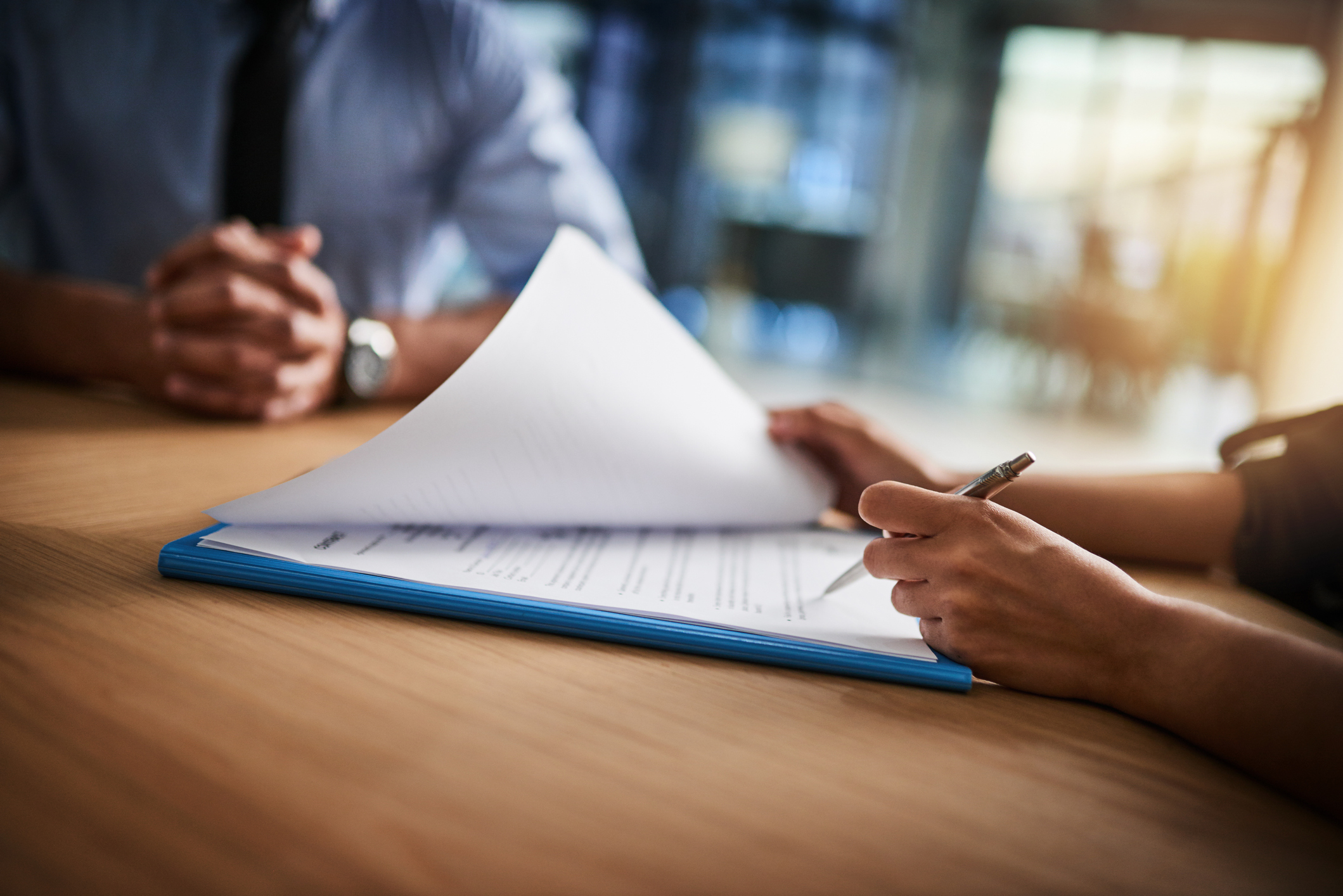 Patient filling out a form for addiction treatment