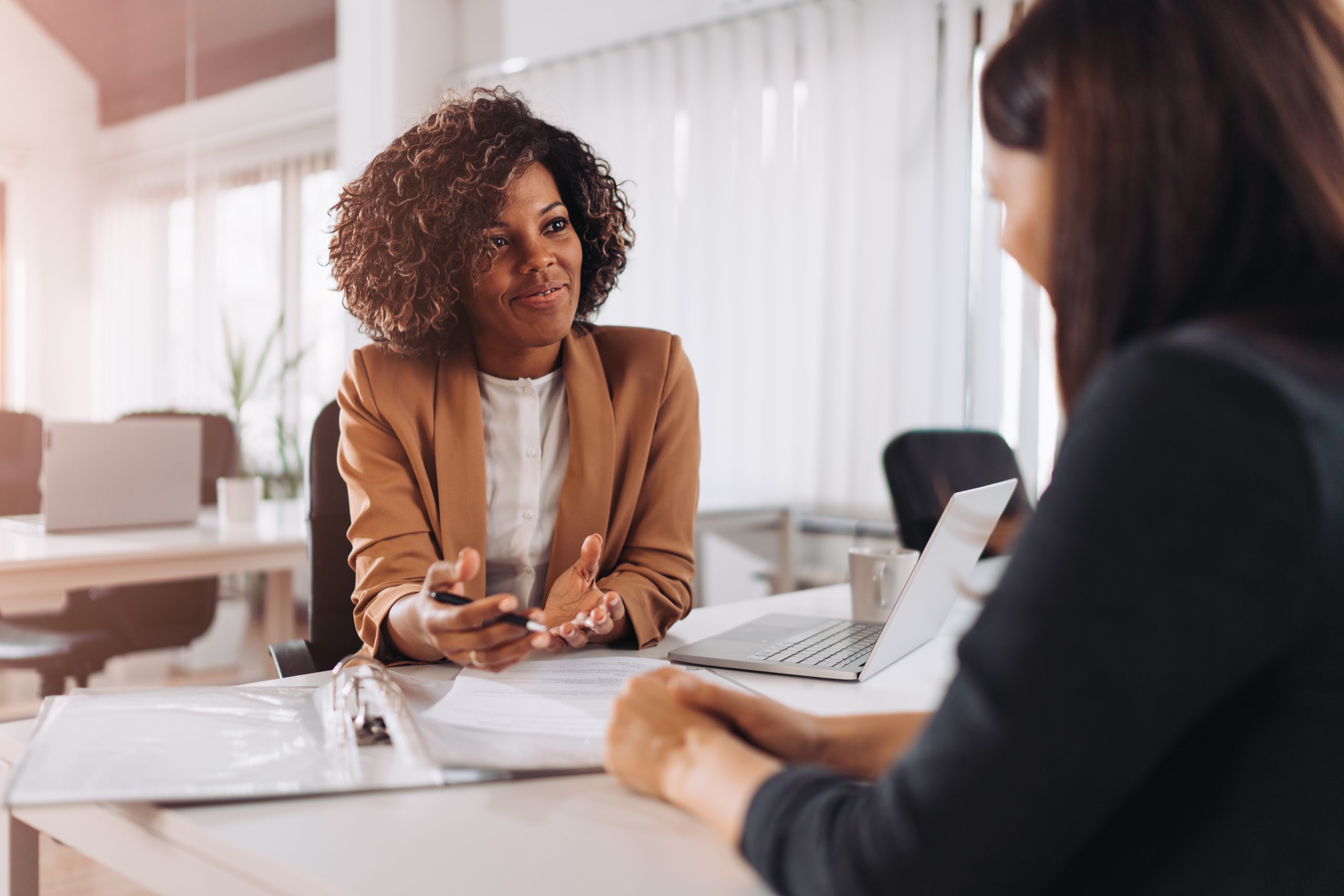 Woman in a job interview for an OBOT facility