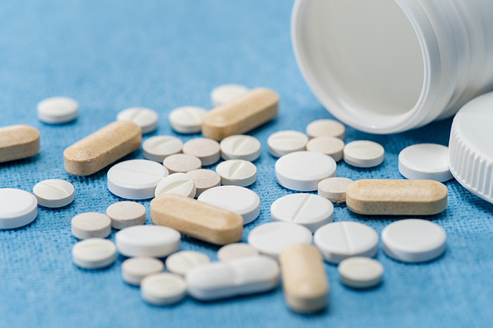 prescription pills spilled on a table