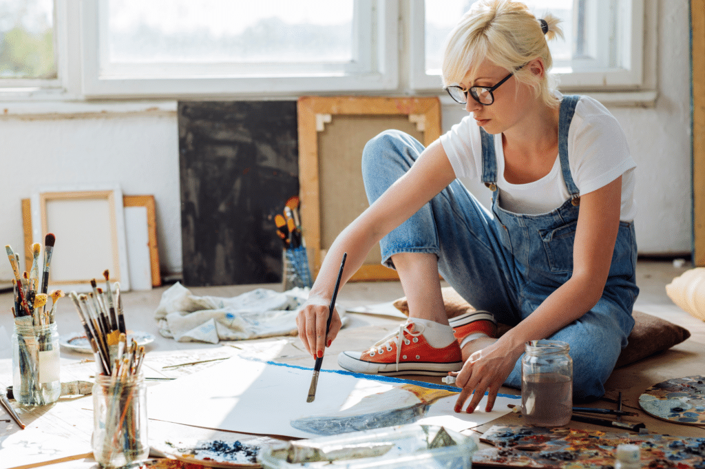 Woman in recovery painting as a hobby 